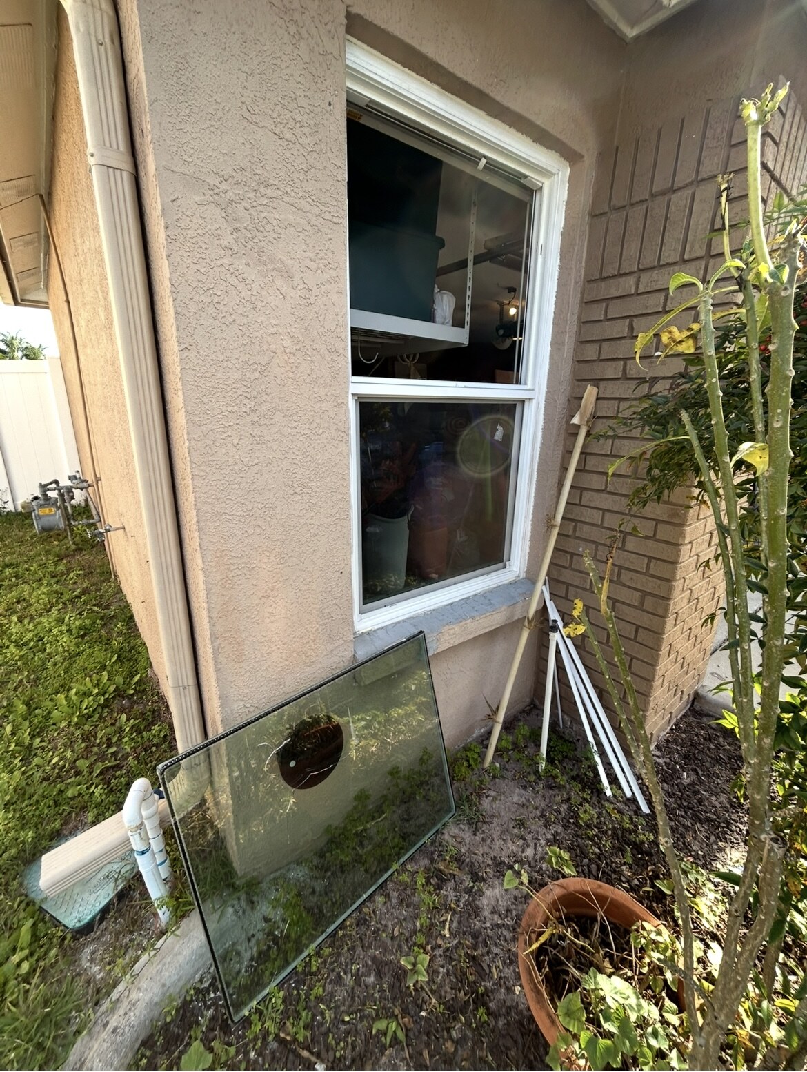 Residential glass removed from window frame